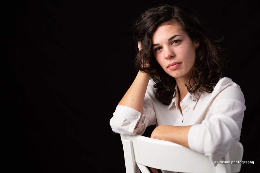 Close studio portrait study against a dark backdrop