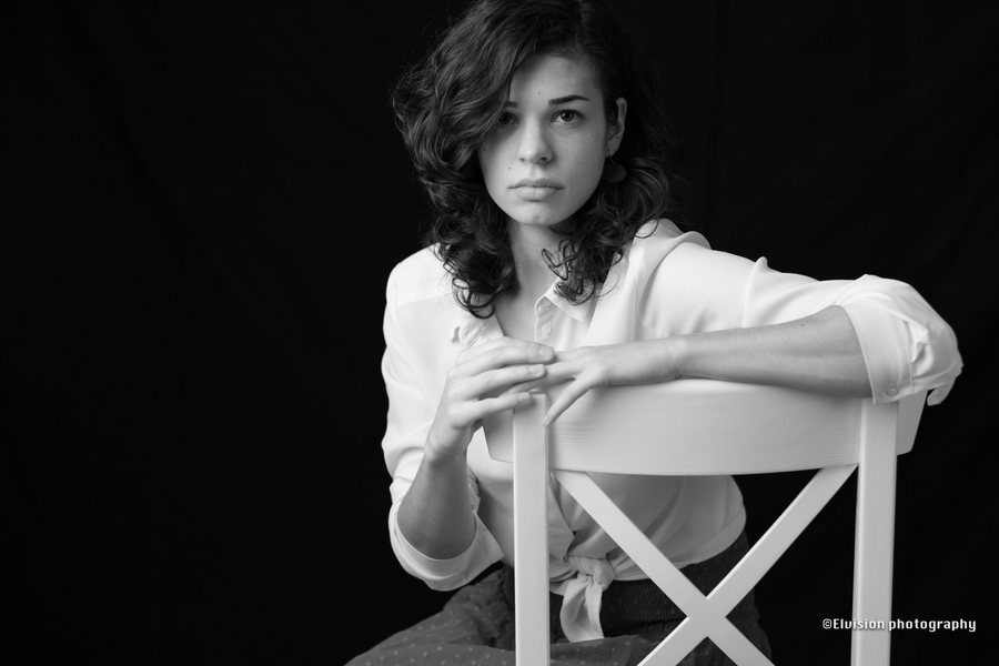 Close studio portrait study against a dark backdrop